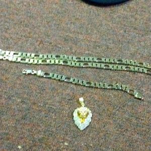 Gold necklace with matching bracelet and well made lion pendant with rhinestones